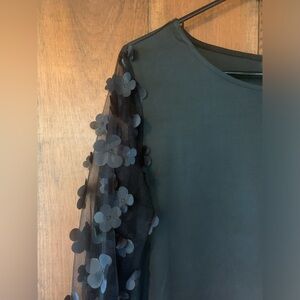 Long black blouse with sheer embellished sleeves